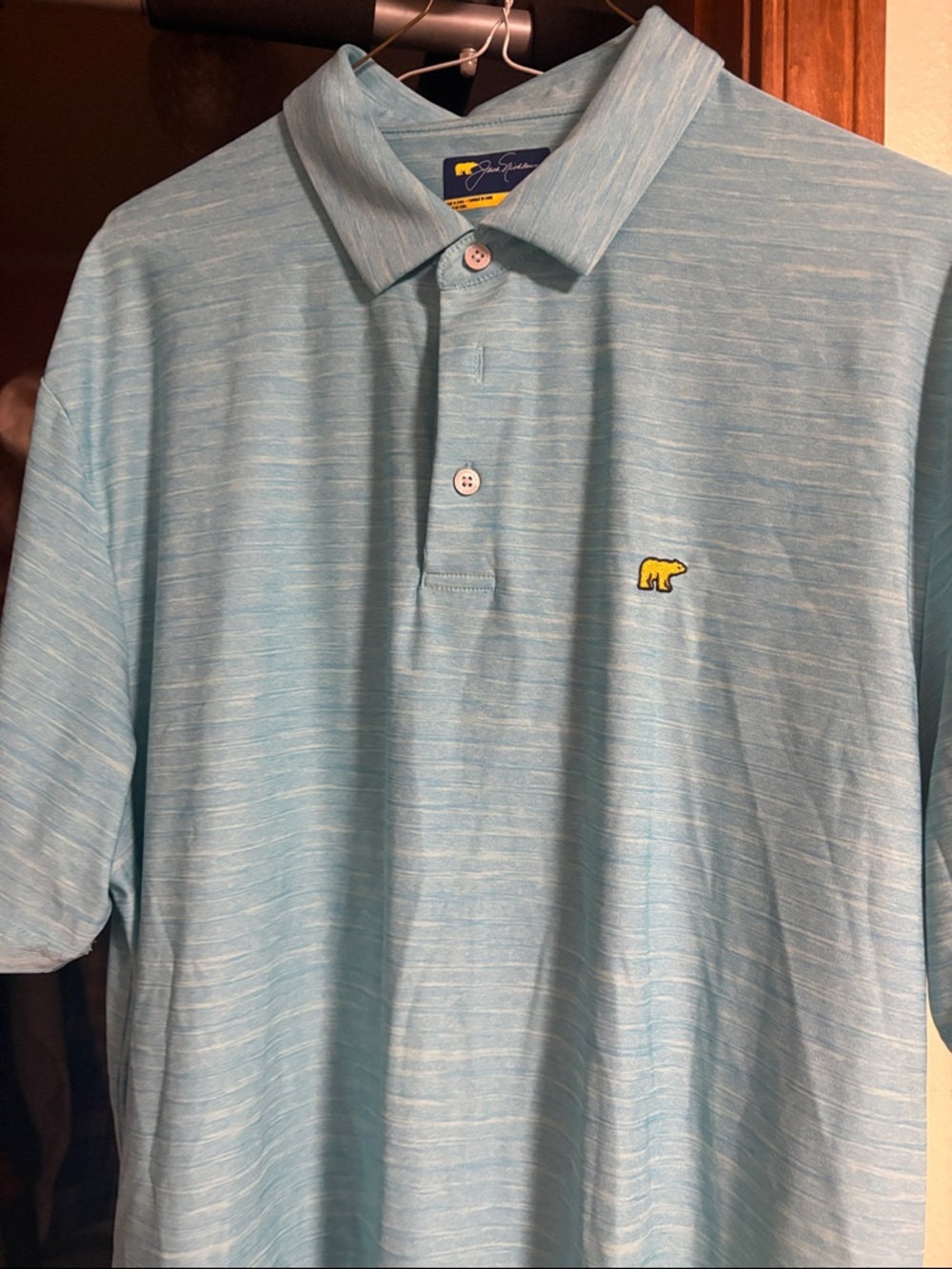 Jack Nicklaus Sky Blue Polo with Yellow Bear Patch large like new